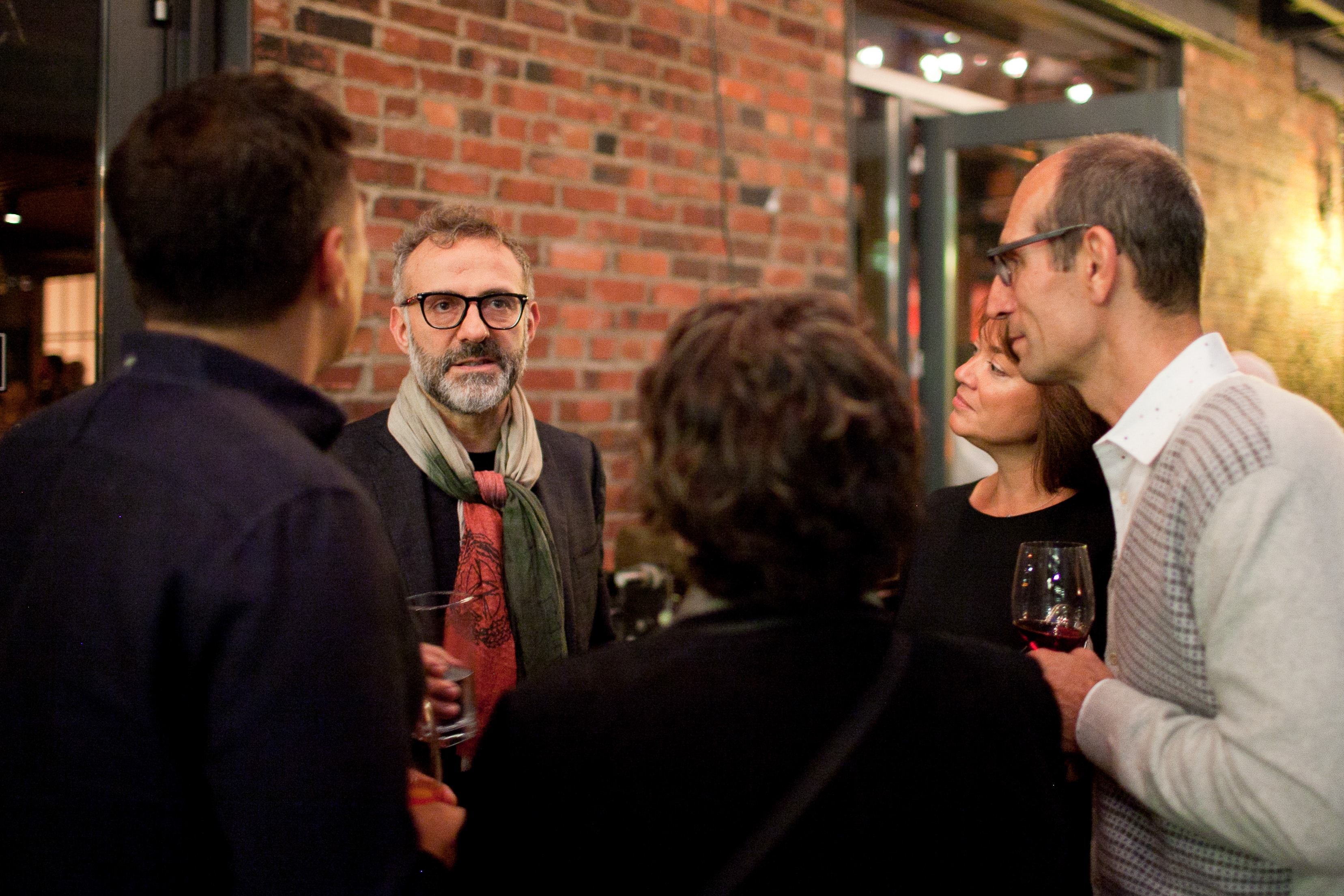 Guests Conversing at Indoor Event — Events photography by Spice & Ink