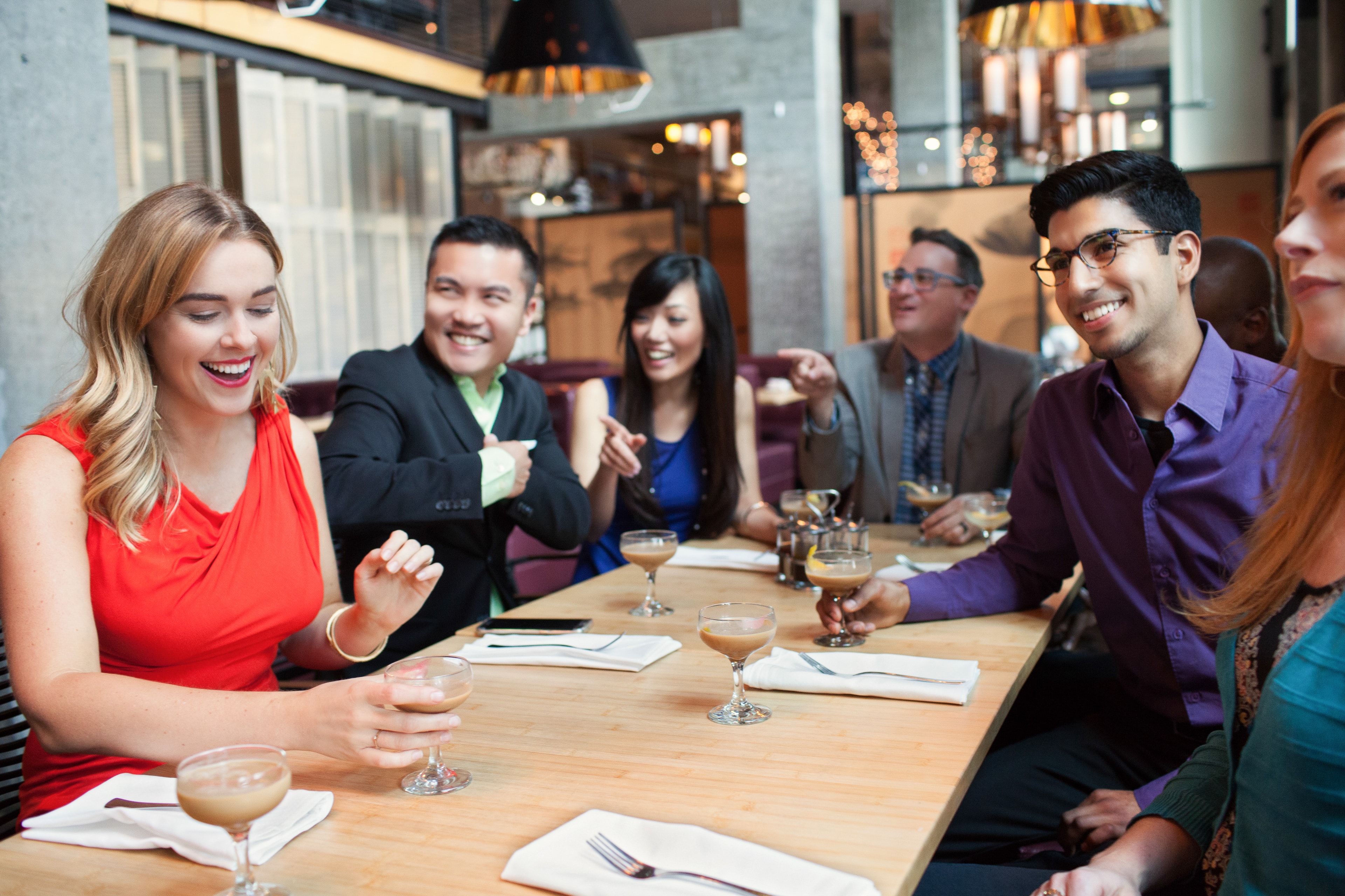 Professionals Socializing at Restaurant — Events photography by Spice & Ink