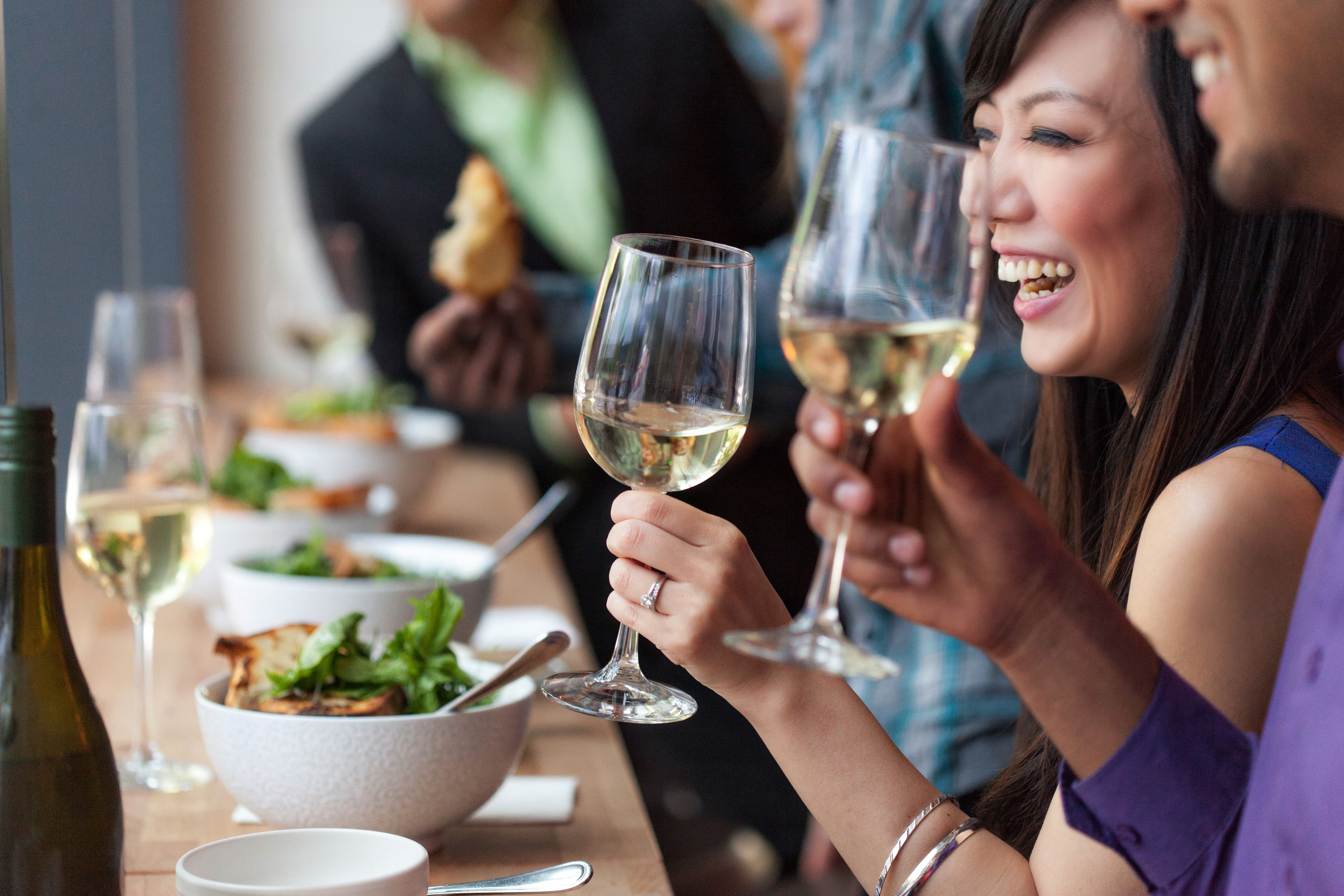 Toasting White Wine at Dinner — Events photography by Spice & Ink