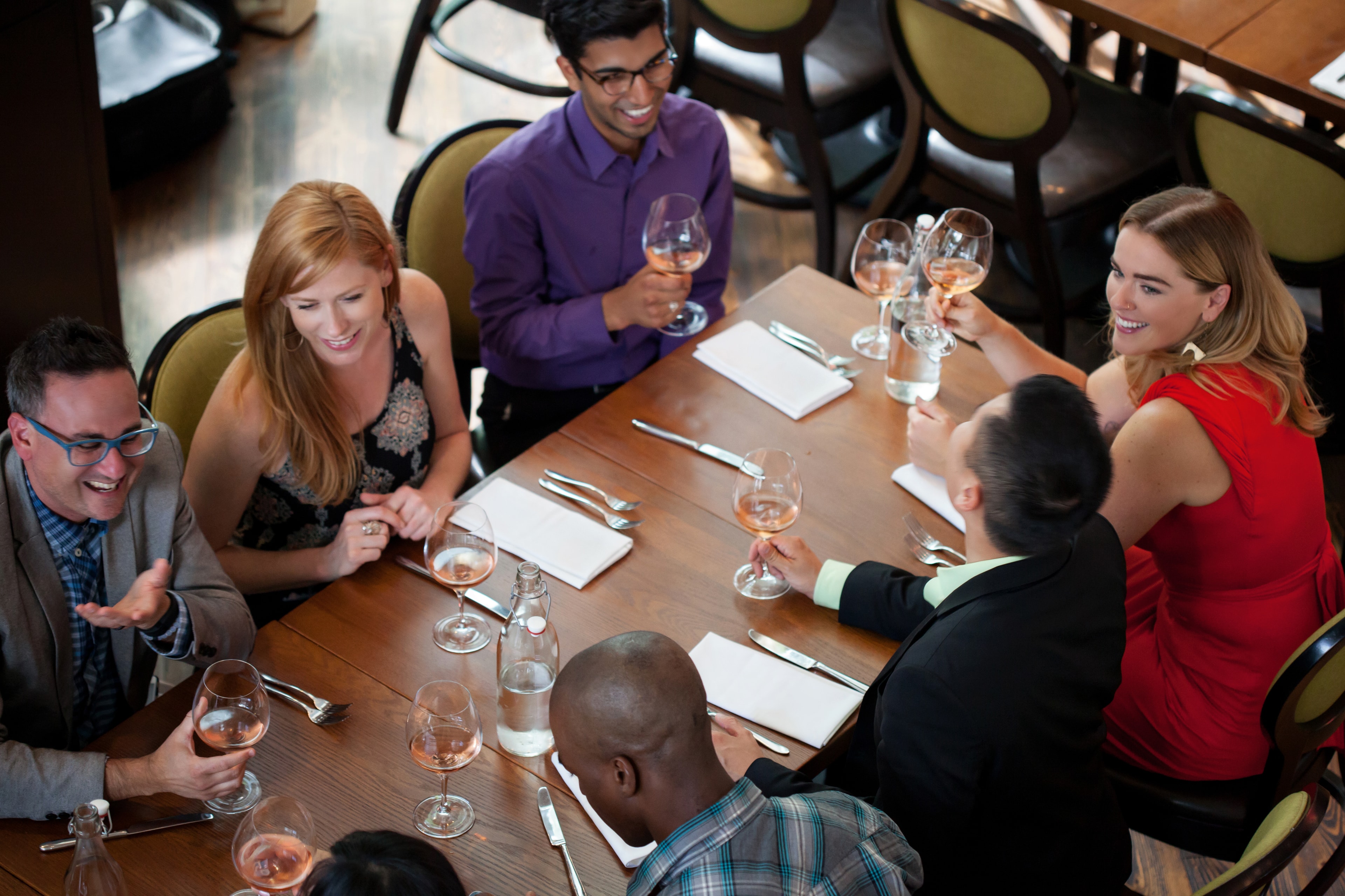Group at Formal Dinner Table — Events photography by Spice & Ink