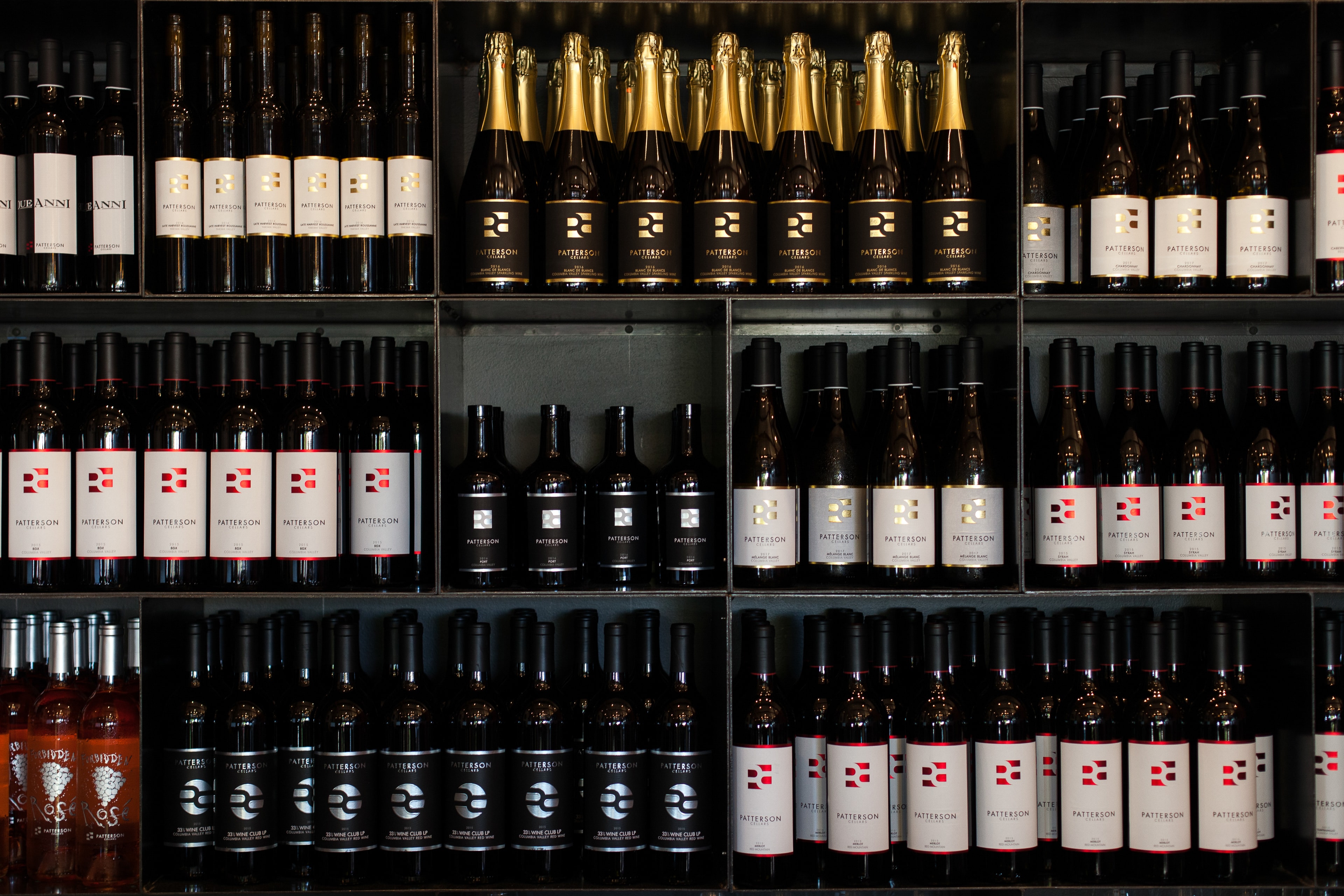 Wine Bottles on Retail Shelves — Products photography by Spice & Ink