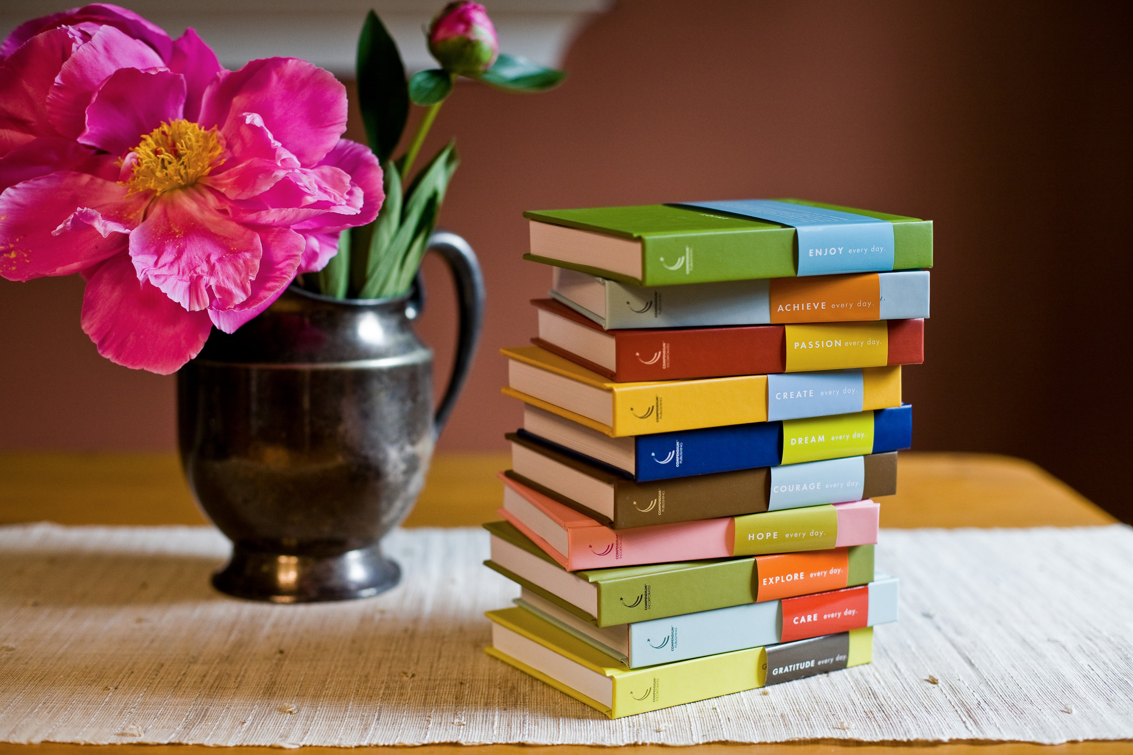 Colourful Books with Peonies — Products photography by Spice & Ink