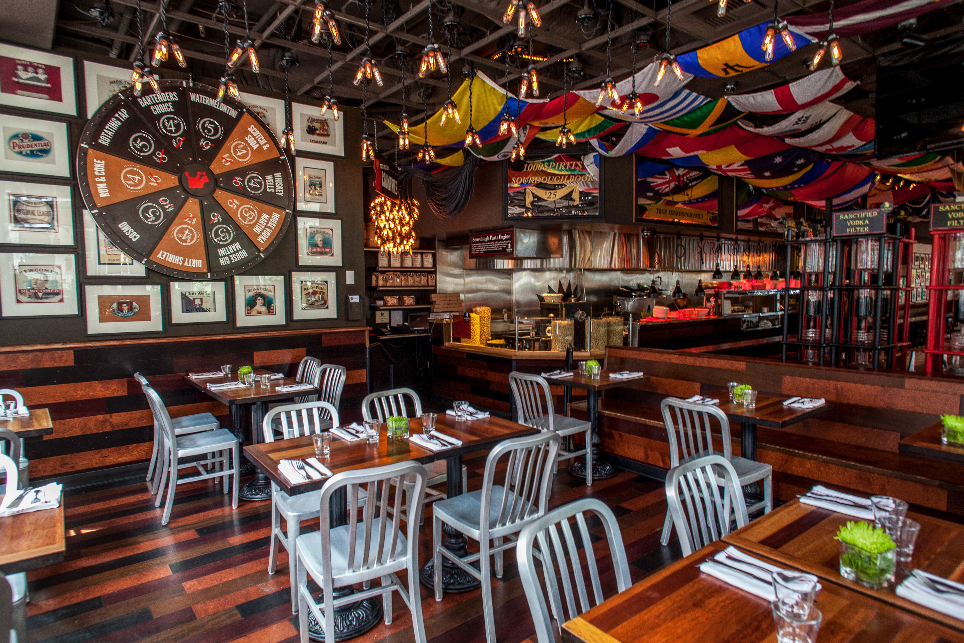 Restaurant with International Flags — Spaces photography by Spice & Ink