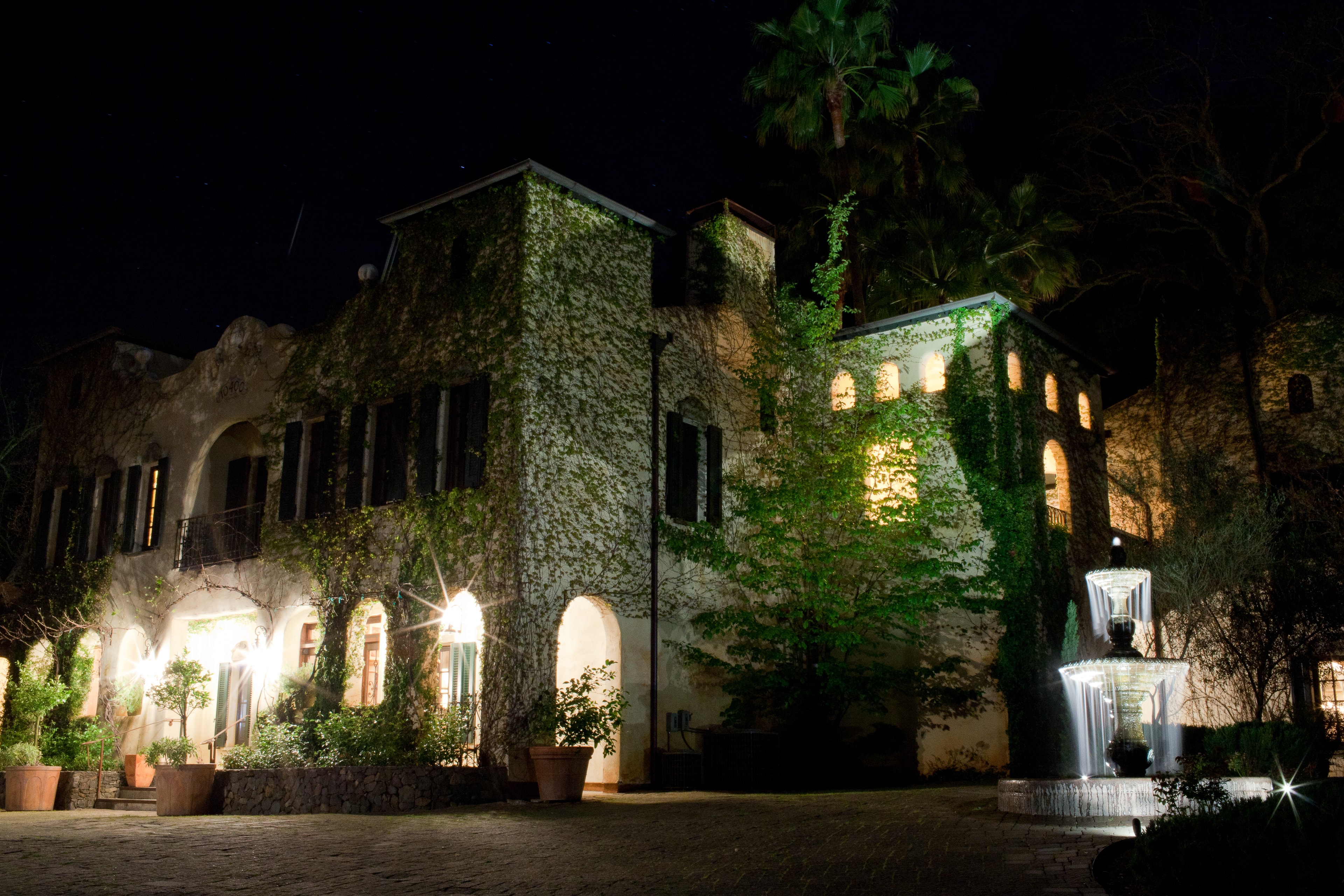 Stone Villa Illuminated at Night — Spaces photography by Spice & Ink