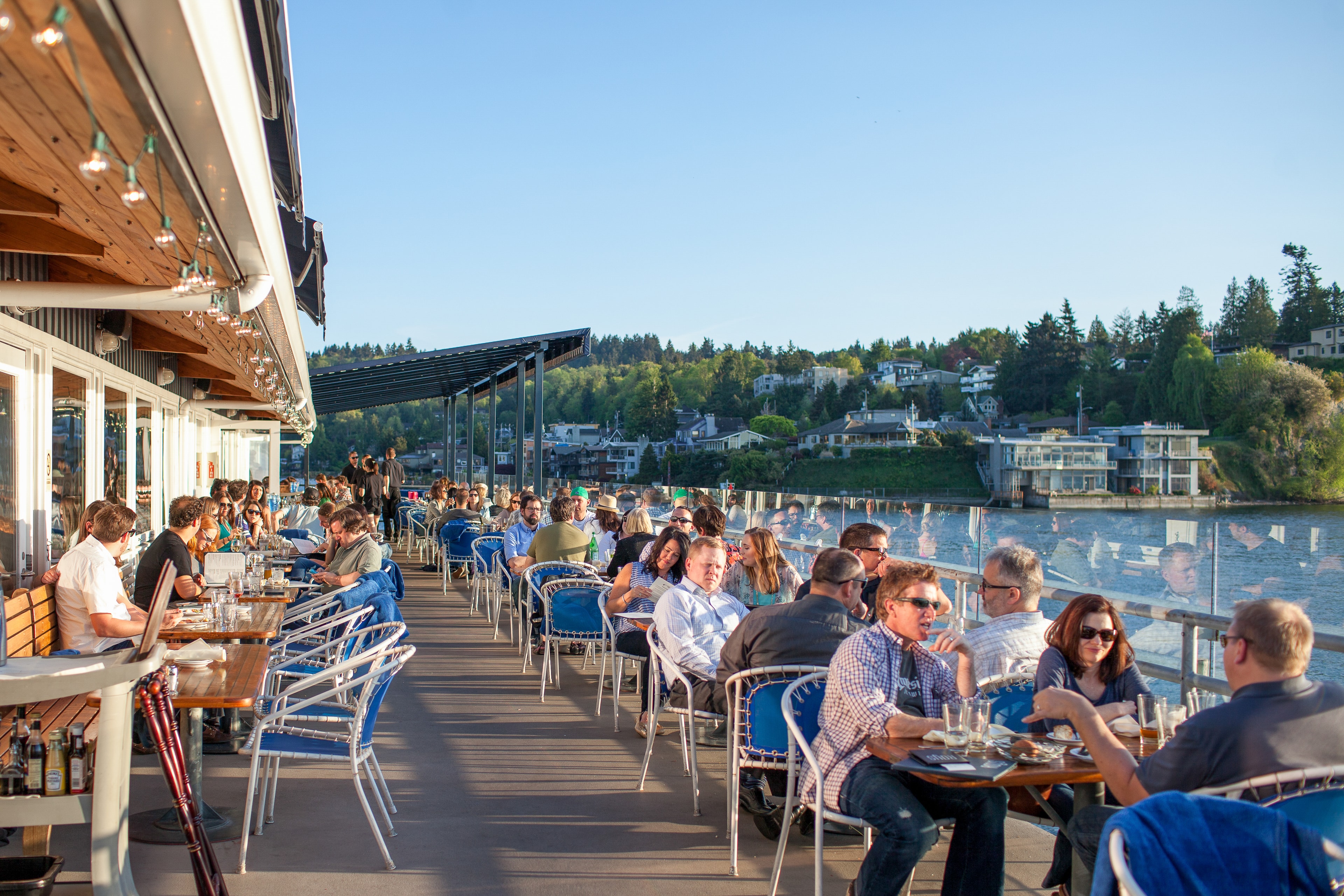 Waterfront Restaurant Patio — Spaces photography by Spice & Ink