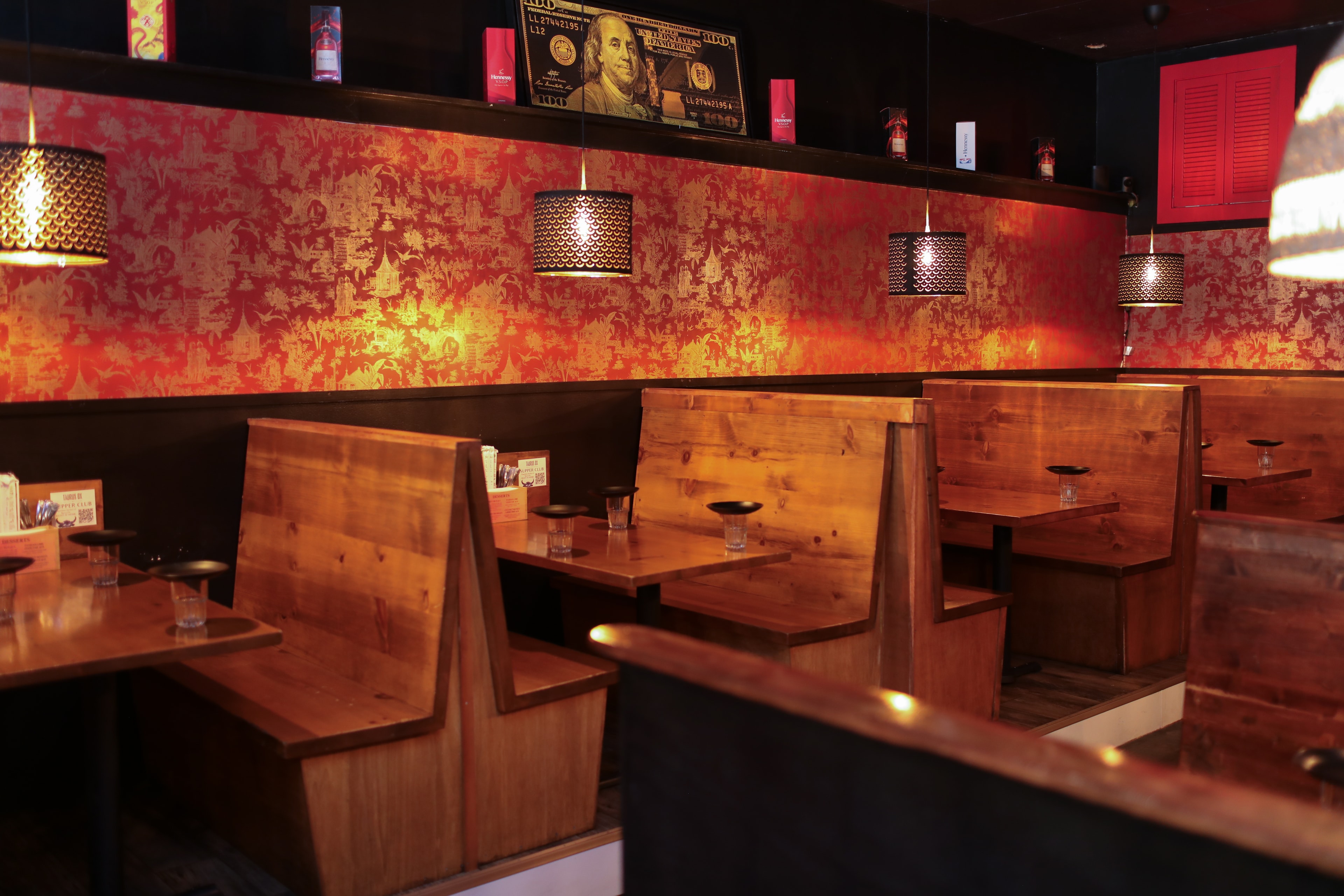 Asian Restaurant Interior with Red Wallpaper Booths — Spaces photography by Spice & Ink